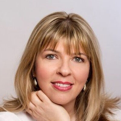 photo of Cathy Pettigrew smiling to camera